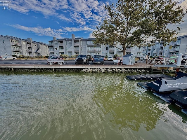 dock area featuring a water view