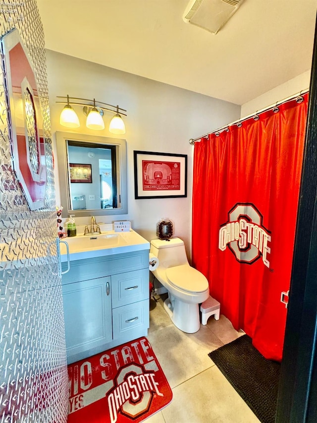 full bath featuring visible vents, vanity, and toilet