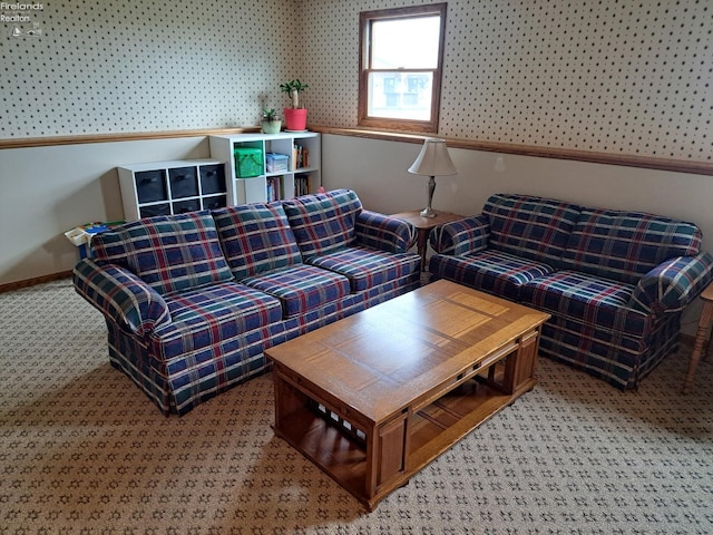 living room with carpet floors and baseboards