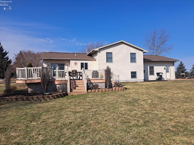 back of property featuring a deck and a yard