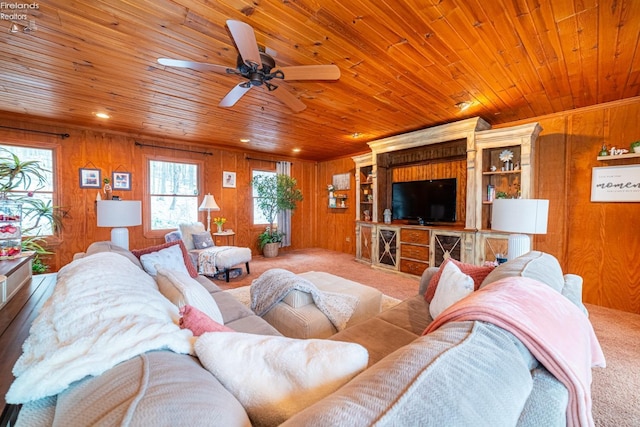 living room featuring wooden ceiling, wooden walls, and carpet flooring