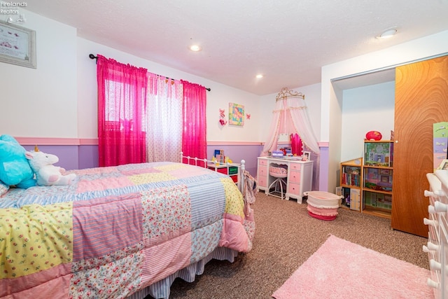 carpeted bedroom with recessed lighting