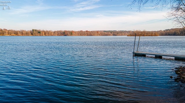 view of dock with a water view