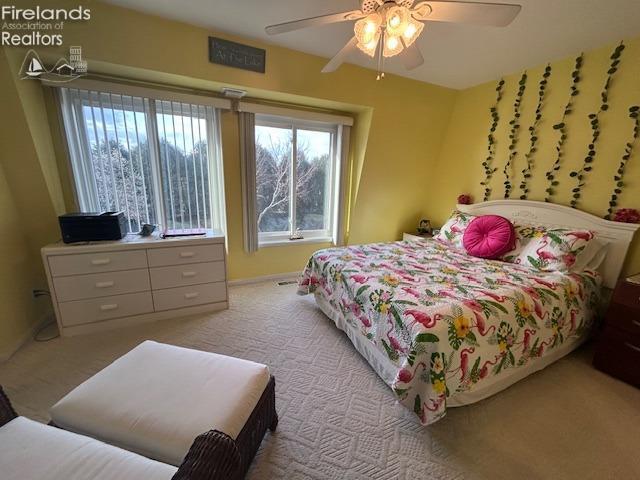 bedroom featuring carpet floors and ceiling fan