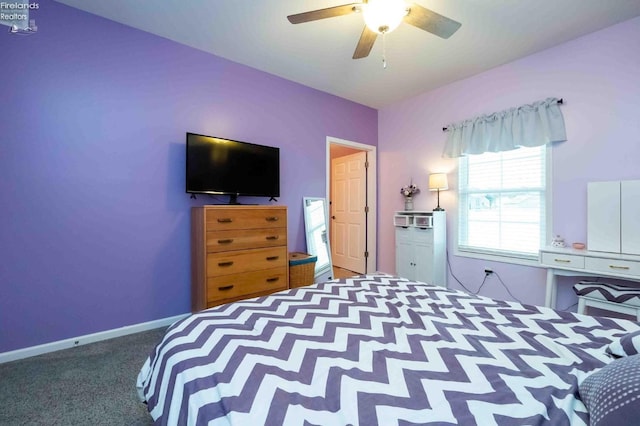 bedroom with carpet, baseboards, and a ceiling fan