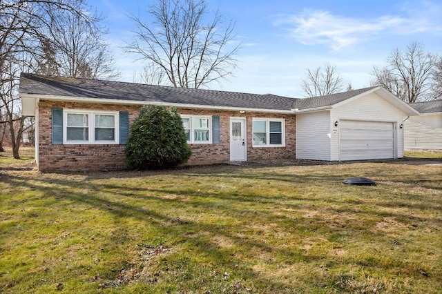 ranch-style home featuring an attached garage, roof with shingles, a front yard, and brick siding