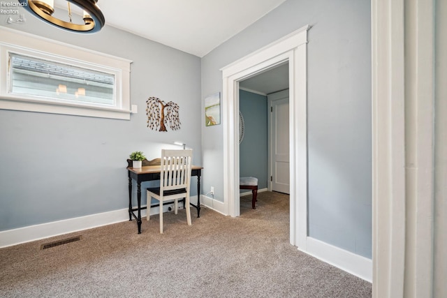 carpeted home office with visible vents and baseboards