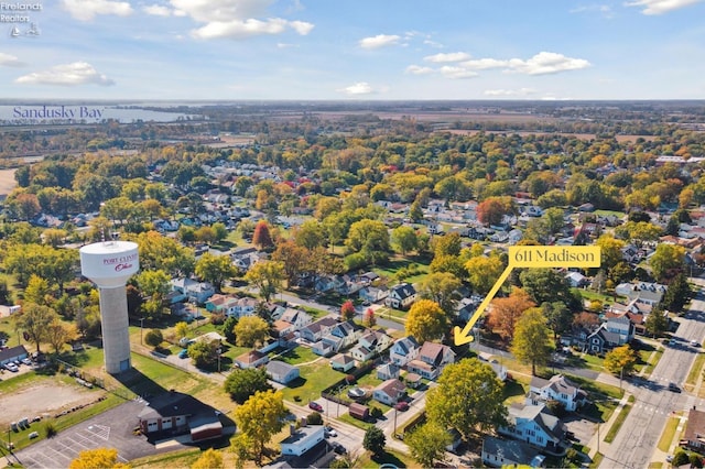 birds eye view of property with a residential view