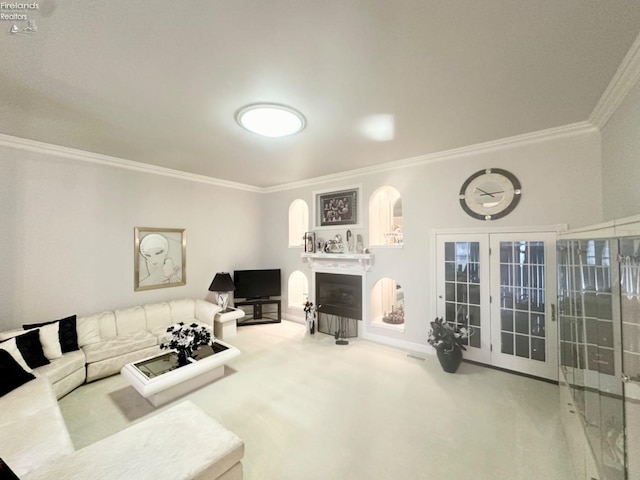 living room featuring carpet floors, a fireplace, and ornamental molding