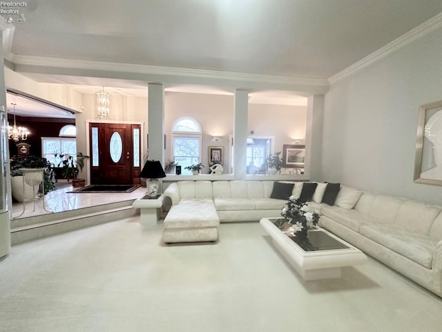 living room featuring a chandelier, carpet flooring, and ornamental molding