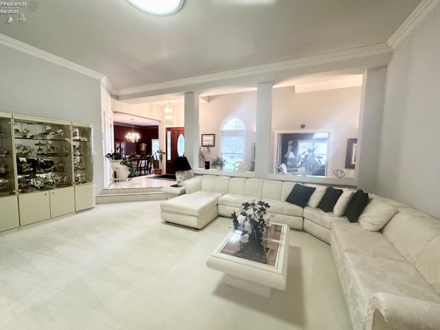 living area with a chandelier, carpet, and crown molding