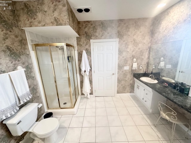 full bathroom with toilet, a stall shower, vanity, tile patterned flooring, and wallpapered walls