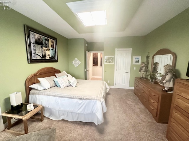 bedroom with carpet floors and baseboards