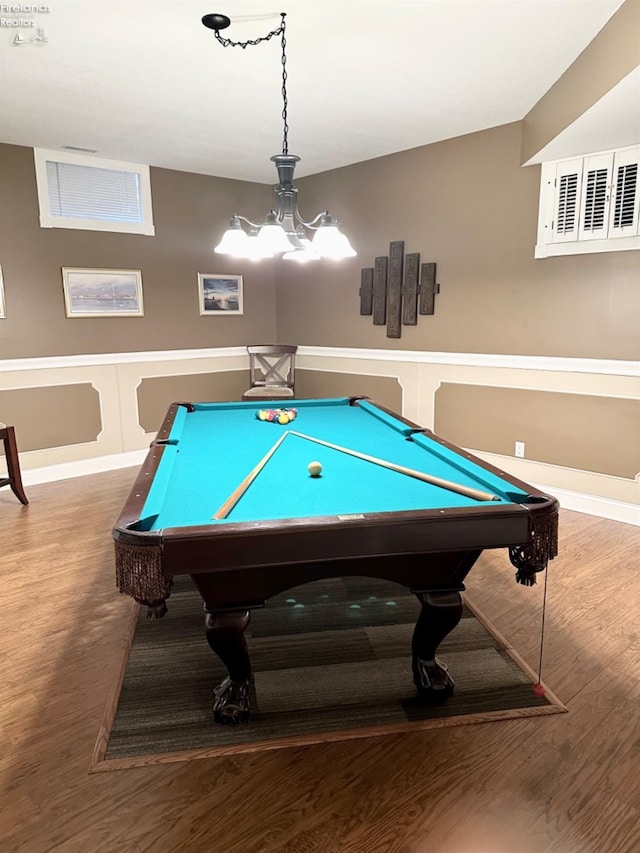 game room featuring visible vents, wood finished floors, and wainscoting