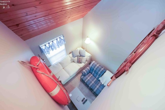 interior space with vaulted ceiling and wood ceiling