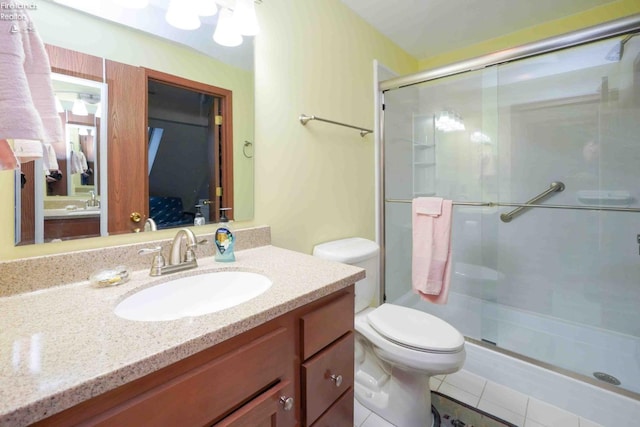 ensuite bathroom with toilet, ensuite bath, tile patterned flooring, vanity, and a shower stall