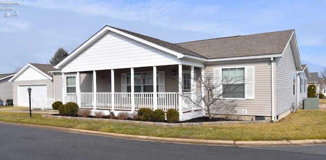 view of front of property with a garage, concrete driveway, roof with shingles, crawl space, and a porch