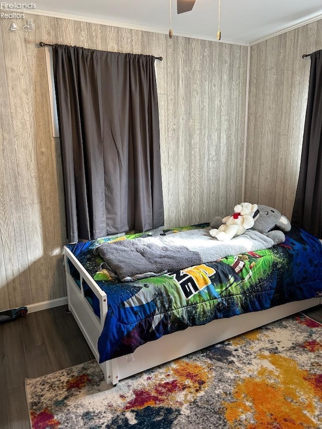 bedroom featuring wood finished floors