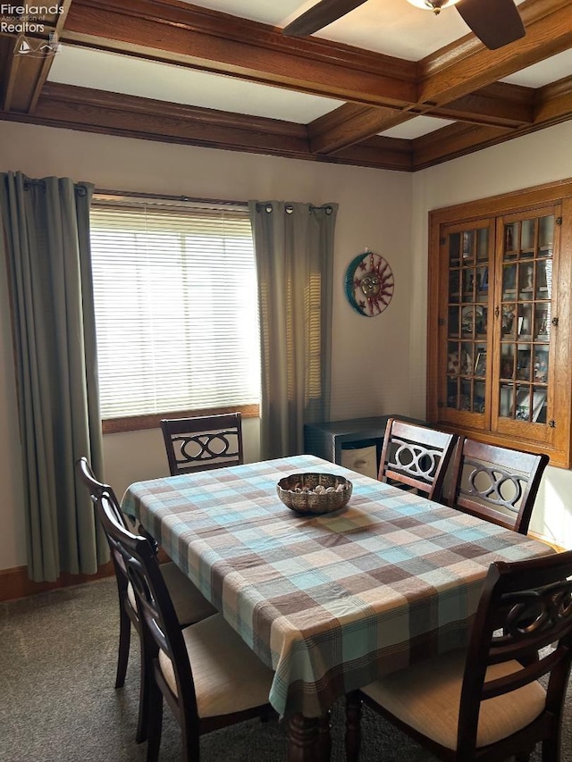 dining room with carpet floors, coffered ceiling, and beam ceiling