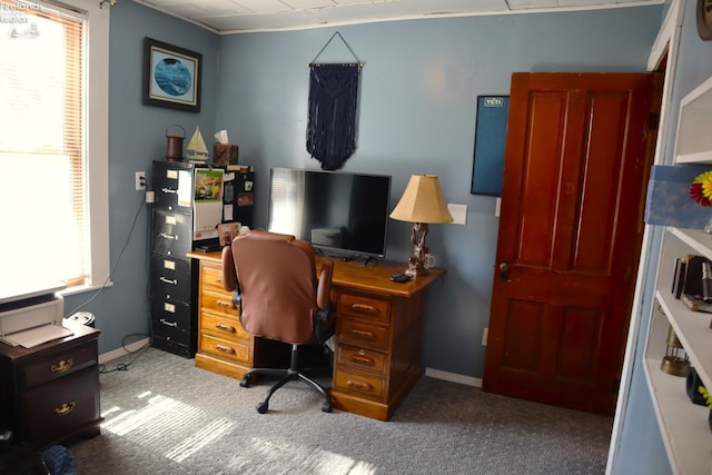 carpeted office featuring baseboards and ornamental molding