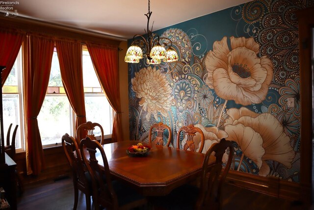 dining room with a chandelier