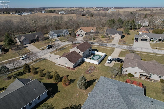 drone / aerial view with a residential view