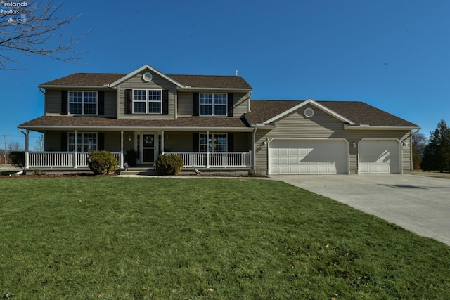 view of front of property featuring a porch, an attached garage, a front yard, and driveway