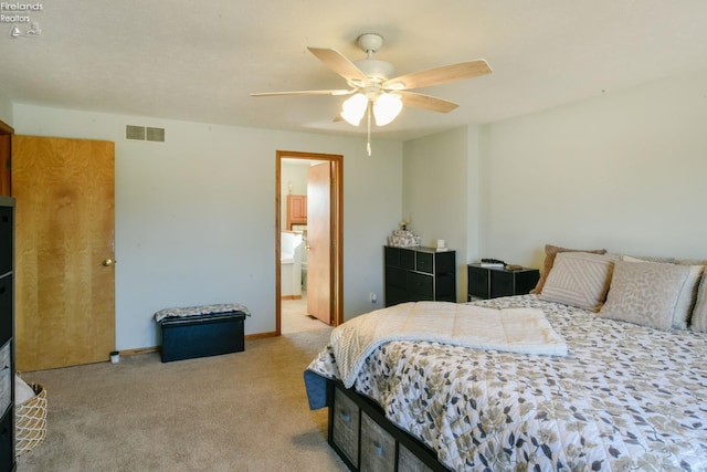 bedroom featuring visible vents, carpet, and a ceiling fan