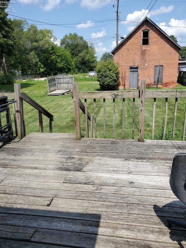 deck featuring a yard