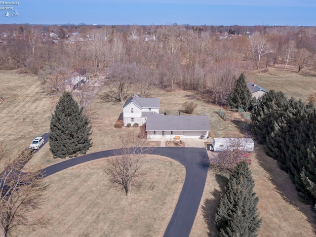 drone / aerial view with a forest view