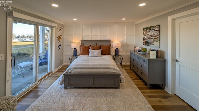 bedroom featuring access to exterior, baseboards, ornamental molding, recessed lighting, and wood finished floors