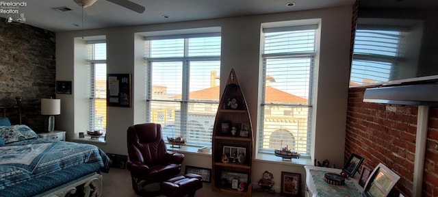 bedroom featuring visible vents