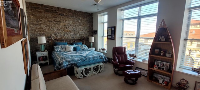 bedroom featuring multiple windows