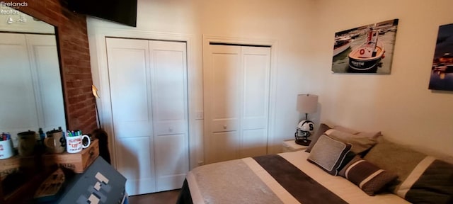 bedroom with two closets