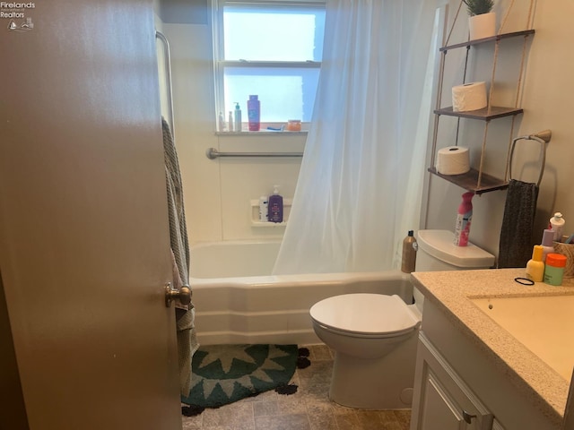 full bathroom featuring shower / bath combination with curtain, toilet, and vanity