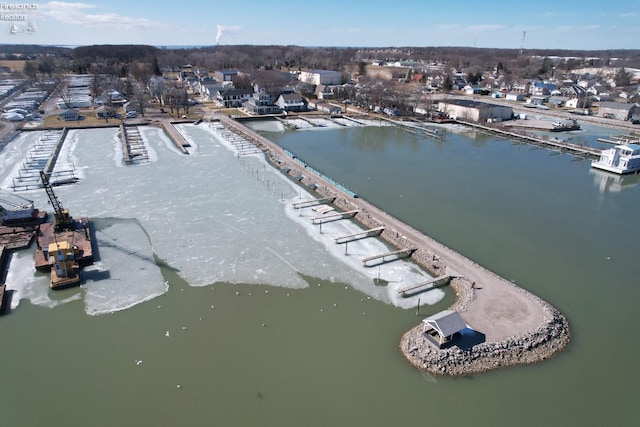 bird's eye view featuring a residential view and a water view