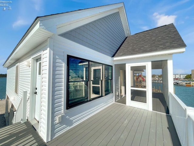 deck featuring a water view