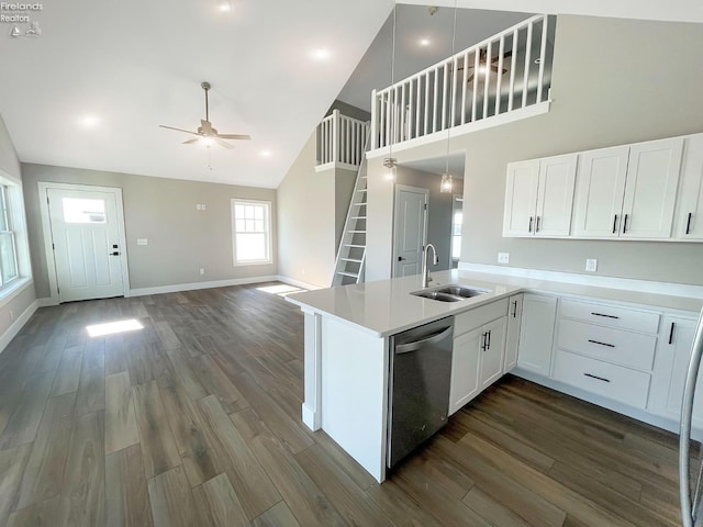 kitchen with a ceiling fan, dark wood-style floors, white cabinetry, a sink, and dishwasher