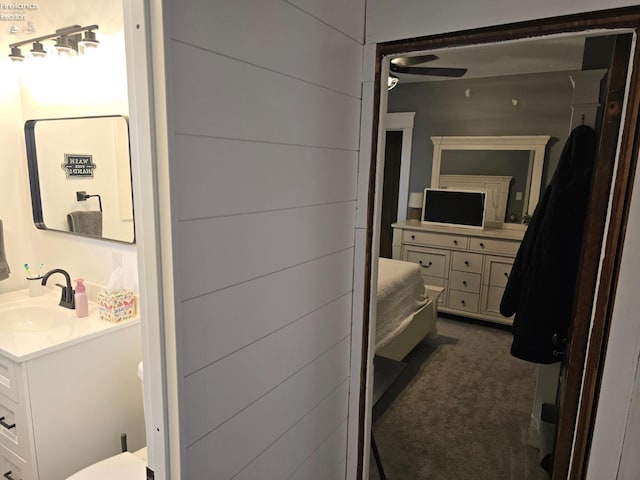 bathroom with vanity and a ceiling fan