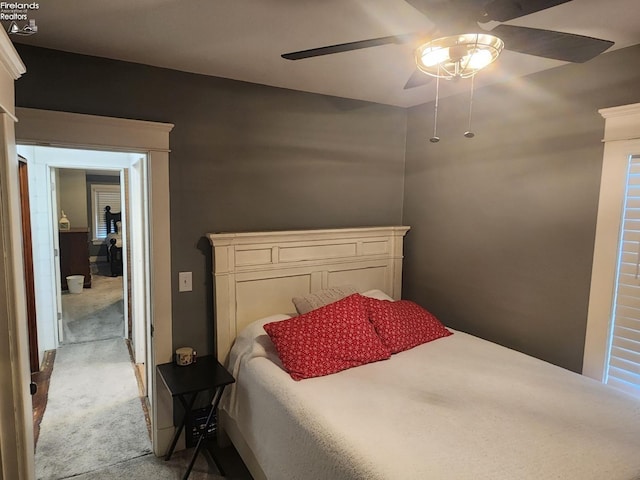 bedroom featuring a ceiling fan and carpet floors