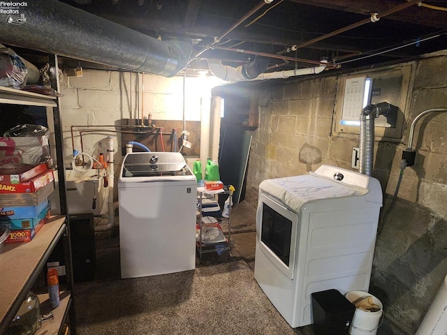 unfinished basement with independent washer and dryer