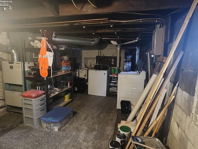 storage area featuring washer and dryer