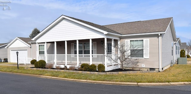 view of front of property with covered porch and roof with shingles