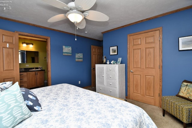 carpeted bedroom featuring ceiling fan, crown molding, and a textured ceiling