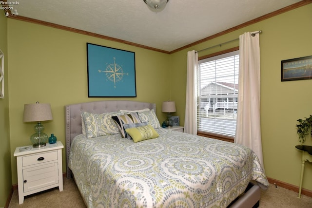 bedroom featuring baseboards, carpet floors, a textured ceiling, and crown molding