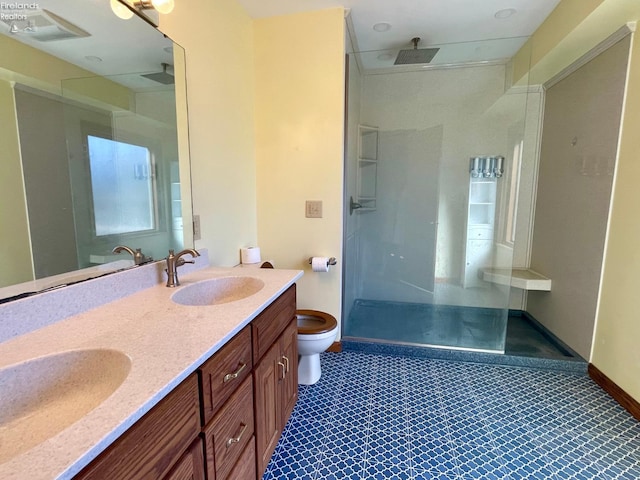 full bathroom featuring a sink, toilet, walk in shower, and double vanity