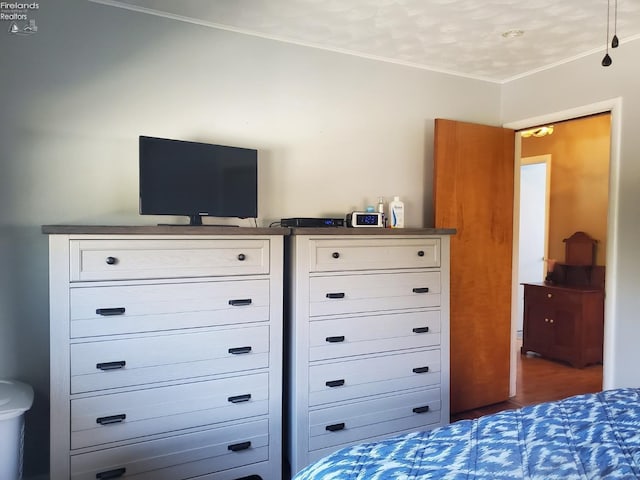 bedroom featuring ornamental molding