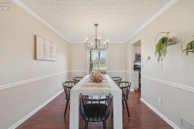 dining space featuring a notable chandelier, visible vents, baseboards, and dark wood-style flooring