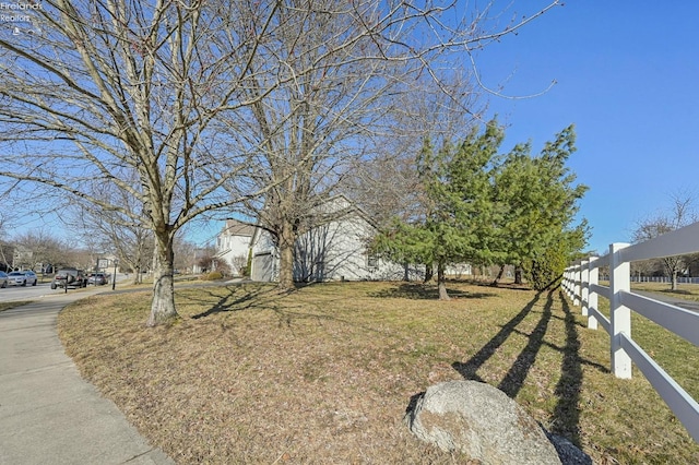 view of yard featuring fence