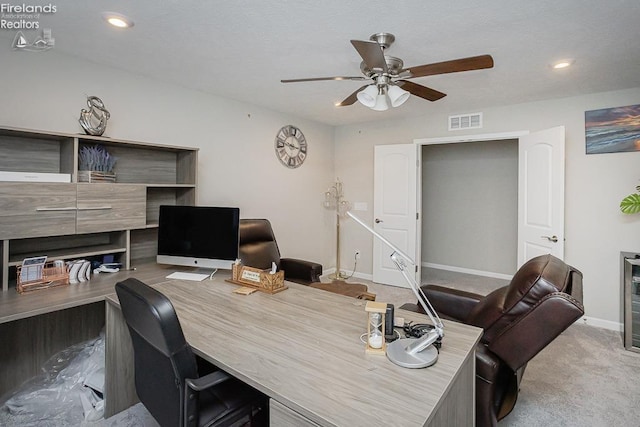 office area with a ceiling fan, visible vents, carpet floors, baseboards, and recessed lighting